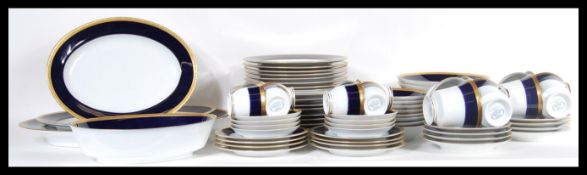 A 20th Century Noritake Legacy tea service in the ' Valhalla ' pattern having banded cobalt blue