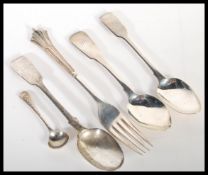 A group of hallmarked silver flatware dating from the early 19th Century to include Robert