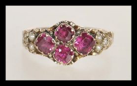 A 19th Century Victorian 9ct yellow gold cluster ring with foliate engraved shoulders and shank, set