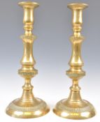 A PAIR OF 19TH CENTURY VICTORIAN BRASS ALTAR CANDLESTICKS
