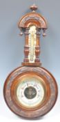 19TH CENTURY WALNUT CASED WALL BAROMETER BY YOUNGS LTD EXETER.