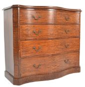 AN EARLY 19TH CENTURY GEORGIAN DARK BIRCH SERPENTINE CHEST DRAWERS.