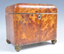 AN EARLY 19TH CENTURY GEORGIAN BLONDE TORTOISESHELL TEA CADDY.