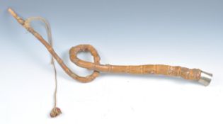 AN UNUSUAL JAPANESE 19TH CENTURY BAMBOO DONKEY WHIP.