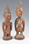 A MALE AND FEMALE PAIR OF WOODEN YORUBA IBEJI