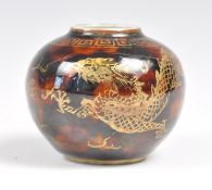 CHINESE 19TH CENTURY MINIATURE GINGER JAR HAVING BROWN TORTOISESHELL GROUND.