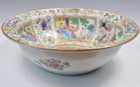 A LARGE 19TH CENTURY CHINESE CANTON FAMILLE ROSE BOWL