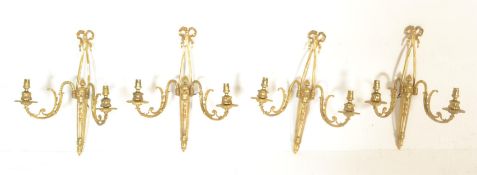 A SET OF FOUR ADAMS REVIVAL GILT ORMOLU BRONZE WALL SCONCES.