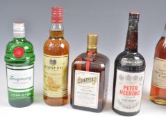 BOTTLE OF MOUNT GAY, TANQUERAY, COINTREAU AND PETER HEERING