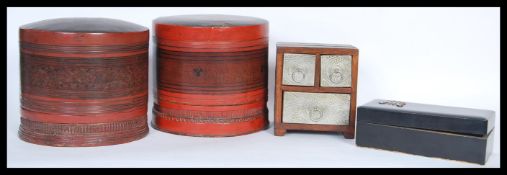 A collection of Chinese items to include a pair of led lacquered rice boxes of cylindrical form, a