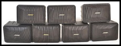 A set of seven Bose model 101 surround music speakers, removed from a local pub during refurb.
