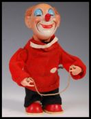 VINTAGE CLOCKWORK MECHANICAL WIND UP SMILING CLOWN