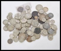 A collection of coins dating from the 19th Century to include silver and half silver coins including