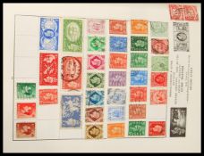 A vintage stamp album dating from the early 20th Century to include stamps from Southern Rhodesia,
