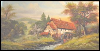 An early 20th Century oil on canvas painting depicting a rural landscape scene with water mill and