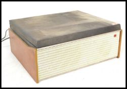 A vintage retro 20th Century Murphy record player turntable deck having a Garrard deck with grille