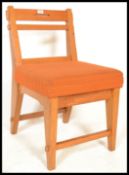 A stunning mid 20th Century beech framed Danish chair, the bar back chair supports united angular