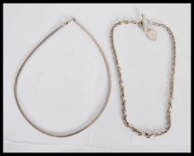 A silver hallmarked ladies chain necklace with a decorative toggle clasp with heart pendant (chain