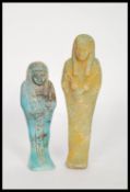 A pair of Egyptian revival 1920's and later Ushabti servant figures to include a ceramic figure