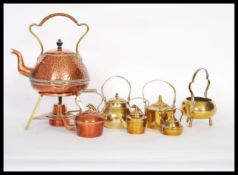 A late 19th / early 20th century Arts and Crafts Henry Loveridge hammered copper spirit kettle