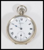 A vintage 20th Century open face pocket watch retailed at Lisle's Exeter in a solid nickel case,