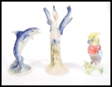 A collection of three 20th Century vintage retro ceramic lustreware model figures by Jema (Holland),