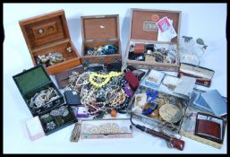 A collection of vintage 20th Century costume jewellery to include brooches such as a white metal
