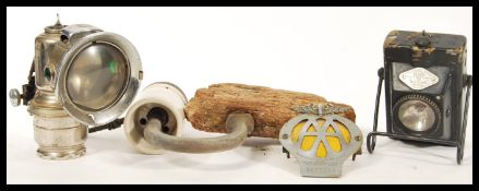 A collection of transport related items to include a bike lamp by Joseph Lucas LTD, AA yellow