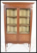 An early 20th Century Edwardian mahogany china display cabinet vitrine having box wood inlay