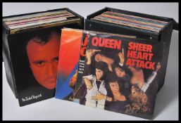 A collection of long play LP vinyl records featuring various artists to include Elton John, Neil