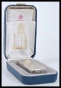 A vintage Dunhill tallboy rollagas lighter complete in original box with paperwork having diamond