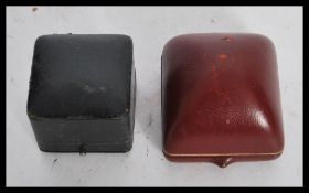 Two vintage 20th Century Kutchinsky ring boxes, the hinged leather ring boxes both marked Kutchinsky