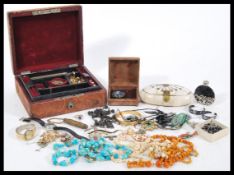A good collection of vintage jewellery to include a Miracle rhinestone brooch, necklaces, perfume