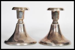 A pair of vintage 20th Century continental silver 830 silver stub candlesticks of large form