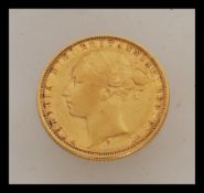 A 1876 Victorian full gold sovereign stamped for the Sydney mint. Weight 8.0g.