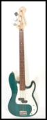 A 20th Century Westfield four string bass guitar, green body with white scratch guard,stamped