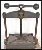 Nipping press. A cast iron nipping press, by Hampson Bettridge & Co., Ltd., finished in black,