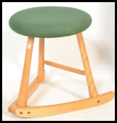 A 20th Century contemporary stool by the Wave Seat Company Keswick Cumbria, the beech frame of