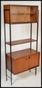 A vintage retro 20th Century teak wood Avalon modular system having an arrangement of shelves and