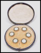 A set of six vintage early 20th Century gents buttons having central square cut grid mother of pearl