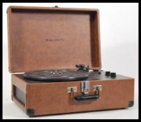 A contemporary Ferguson record player deck having USB compatibility. Hinged lid opening to reveal