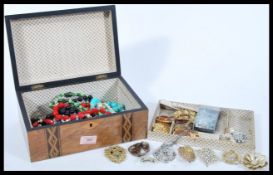 A collection of vintage costume jewellery to include a good collection brooches, a selection of