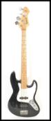 A 20th Century Hohner Rockwood bass guitar in black lacquered finish, model JB - 68
