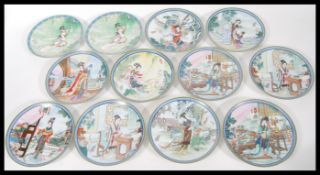 A collection of twelve 1989 Imperial Jingdezhen porcelain decorative collectors plates, depicting