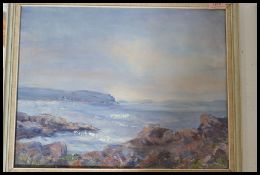 A original oil on canvas painting of a coastal scene depicting a seascape under stormy skies.