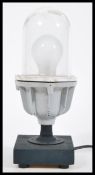 A vintage retro 20th Century Coughtrie ships light having a steel body with glass  bulb dome. Set wo