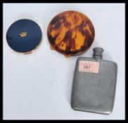 A collection of vintage compacts and lighters to include a Art Deco 1930's Cartier license Dunhill