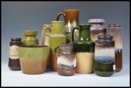 A collection of vintage retro 20th Century West German fat lava style pottery all in a green and