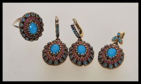 A stamped 925 Renaissance style demi parure jewellery set to include a ring with an oval panel