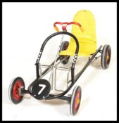 A vintage retro 20th Century Mobo childs go cart pedal car Trackmaster having painted numeral